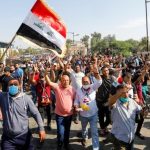 Two killed, 26 wounded as protests flare again in Iraq