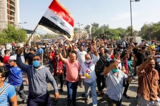 Two killed, 26 wounded as protests flare again in Iraq