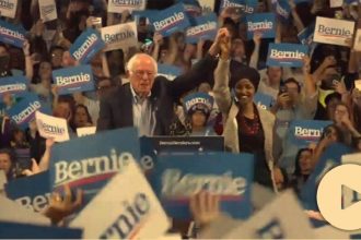 Ilhan Omar, at Bernie Sanders rally, calls for 'mass movement of the working class' amid 'Lock him up' chants