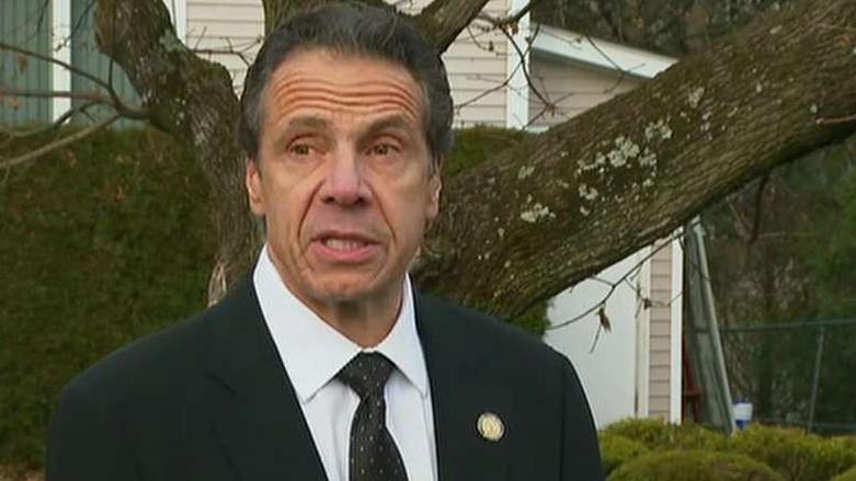 new-york-gov.-cuomo-helps-rescue-trapped-motorist-from-wreck