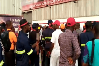 workers-of-coco-cola-ghana-protest-against-removal-of-md