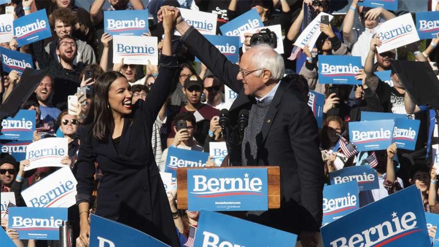 aoc,-michael-moore-pinch-hit-at-iowa-rally-with-bernie-sanders-in-dc-for-trump’s-senate-impeachment-trial