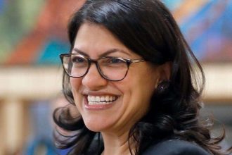 Bernie backer Tlaib invokes Anita Hill to undercut Biden