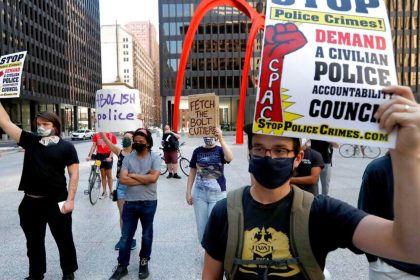 A group of Chicago activist organizations filed a lawsuit Thursday requesting that a judge block federal agents from intervening in police protests, arguing that the surge ordered by President Trump will curtail residents' ability to hold demonstrations.