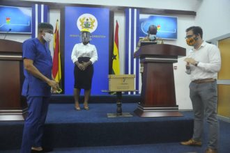 The Managing Director of TOP ACHIEVE COMPANY LTD, Mr. Roy Fogel, has presented some PPEs to the National COVID 19 Trust Fund.