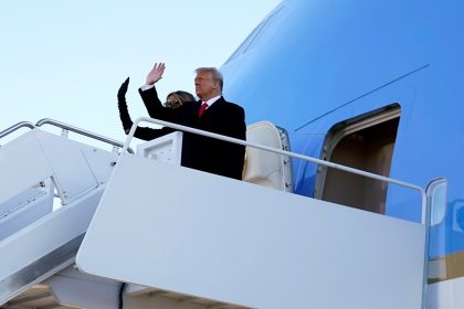 Trump hints at political comeback as he departs White House
