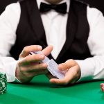 What is the role of a live dealer at an online casino?