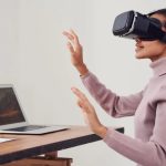 Free Woman Using Virtual Reality Goggles Stock Photo