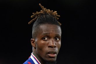 Paul Merson sends transfer warning to Wilfried Zaha amid Arsenal interest.