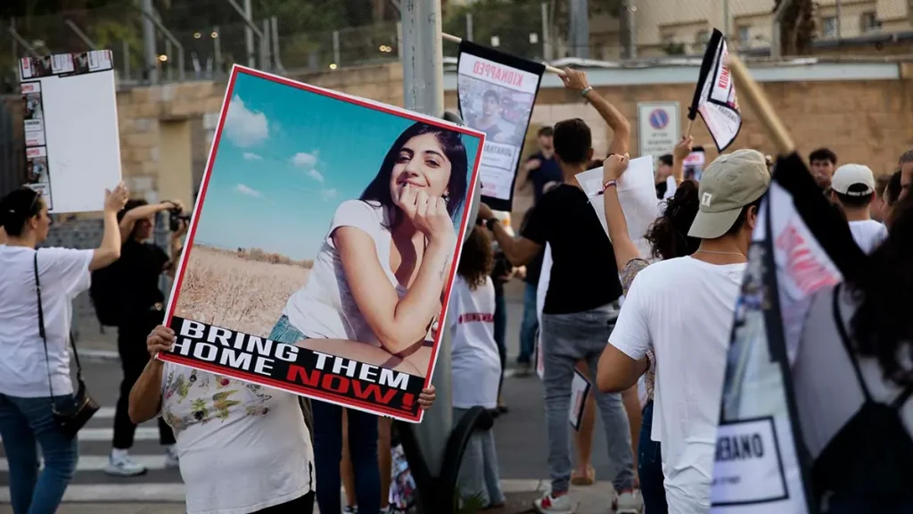 Families and relatives of hostages taken to the Gaza Strip perform a protest in Tel Aviv, Israel, demanding that the Israeli government free their loved ones. 