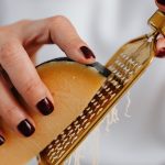 How Many Liters of Milk must be used for a Wheel of Grana Padano?