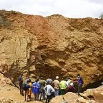 An uncontrolled gold mine in Mali collapsed, leaving more than 70 people dead, according to an official.