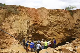 An uncontrolled gold mine in Mali collapsed, leaving more than 70 people dead, according to an official.