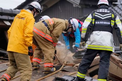 Japanese rescue teams race to locate survivors as the death toll from the earthquake rises