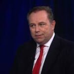 Christopher Ruddy biography