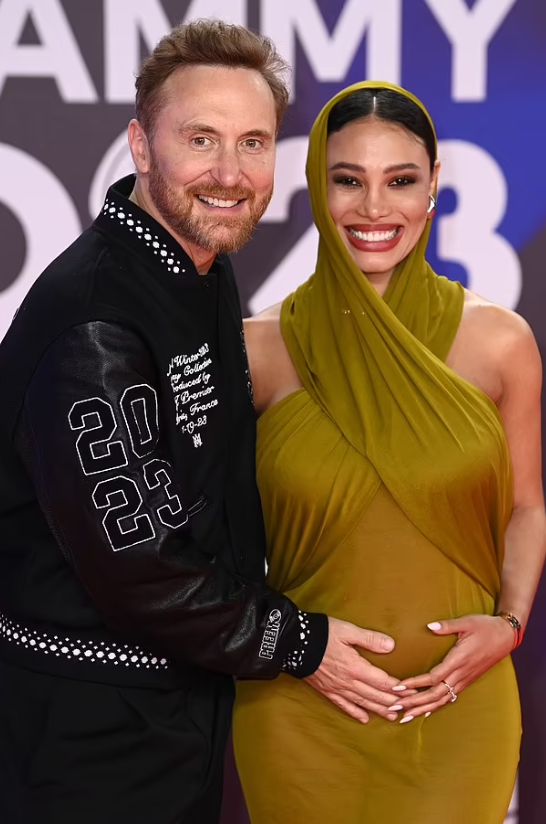 David Guetta Kissis Pregnant Girlfriend Jessica Ledon at Pre-GRAMMY Gala
