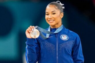 Why was Jordan Chiles stripped of her Olympic bronze Medal?