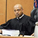 A teen arrested during field sues a judge