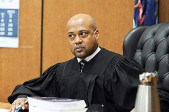 A teen arrested during field sues a judge