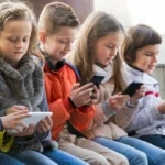 Children using smartphones