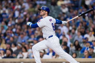 Chicago Cubs Player Tosses Beer Money to Fans in Left Field Stands