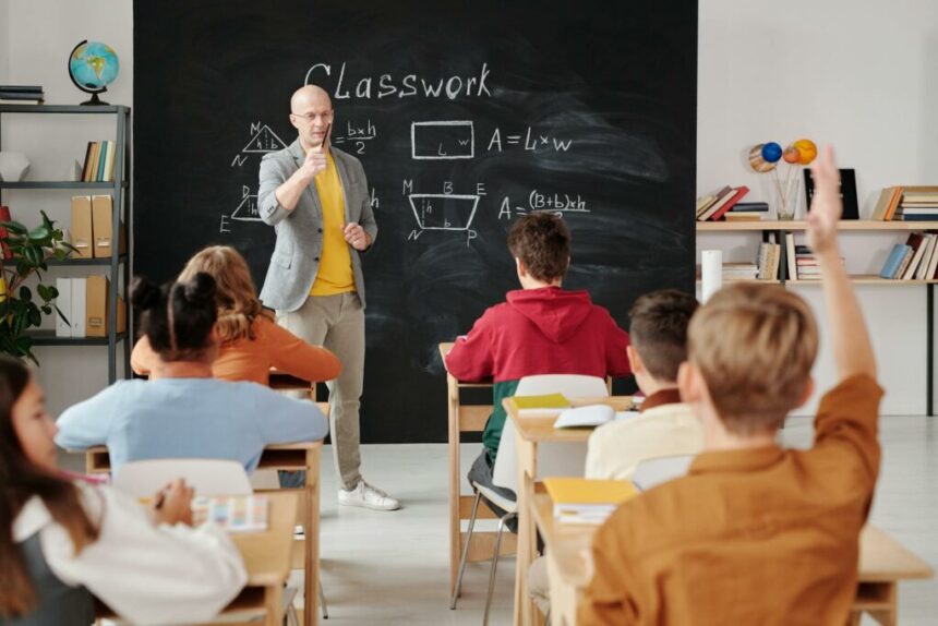 Teacher teaching pupils