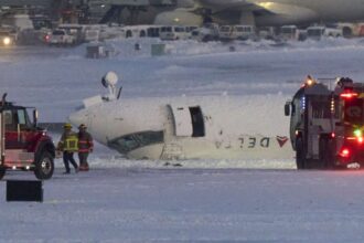 Delta Plane flips upside down at injuring 18