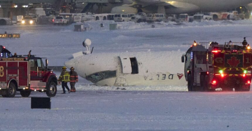 Delta Plane flips upside down at injuring 18