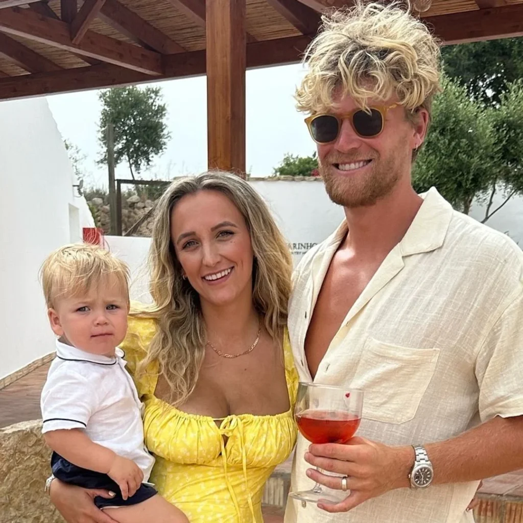 Tiffany Watson with her husband, Cameron, and child