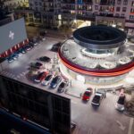 Elon Musk’s Tesla Opens a Diner with Movie Screens, Robots & 80 Superchargers