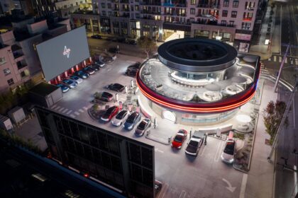 Elon Musk’s Tesla Opens a Diner with Movie Screens, Robots & 80 Superchargers