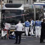 Six killed by Palestinian gunmen at Jerusalem bus stop