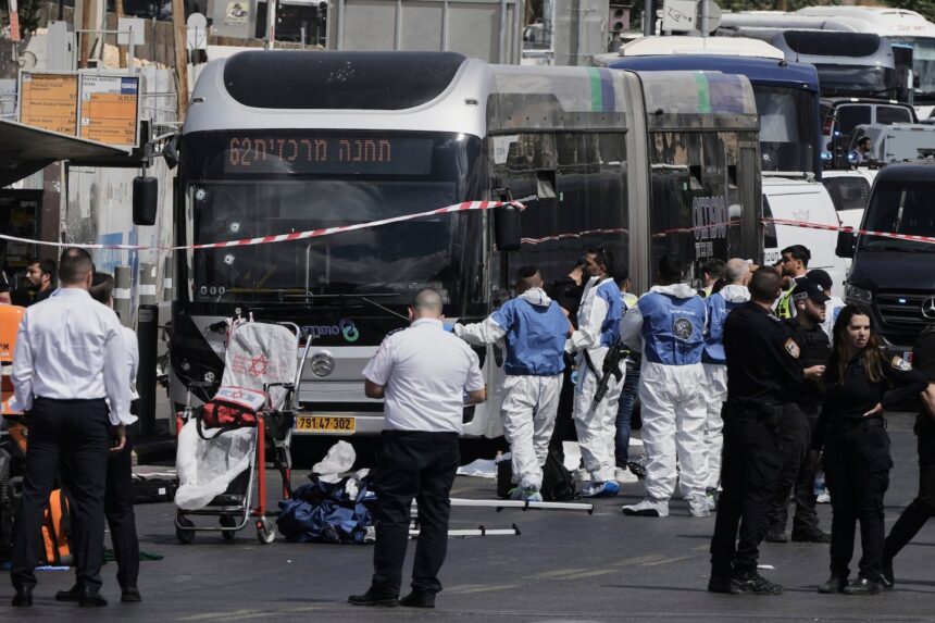 Six killed by Palestinian gunmen at Jerusalem bus stop